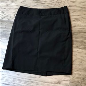 Black pencil skirt with subtle gray pinstripe